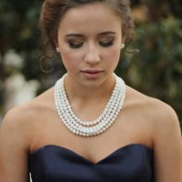 woman with pearl necklace