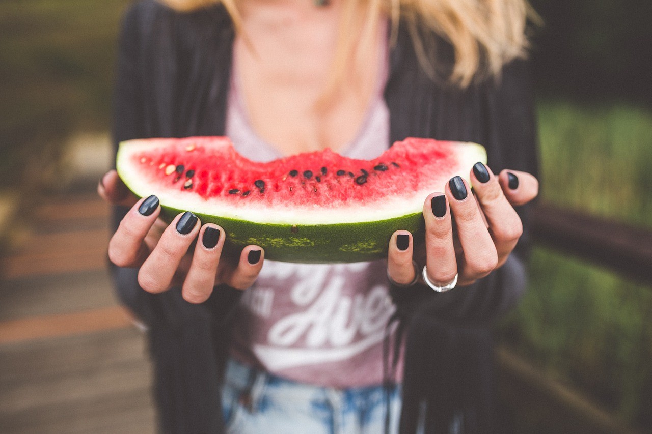 vegan woman with watermelon