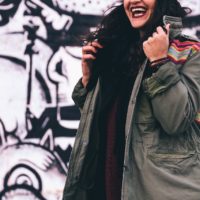 girl in military green parka