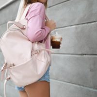stylish girl with a backpack