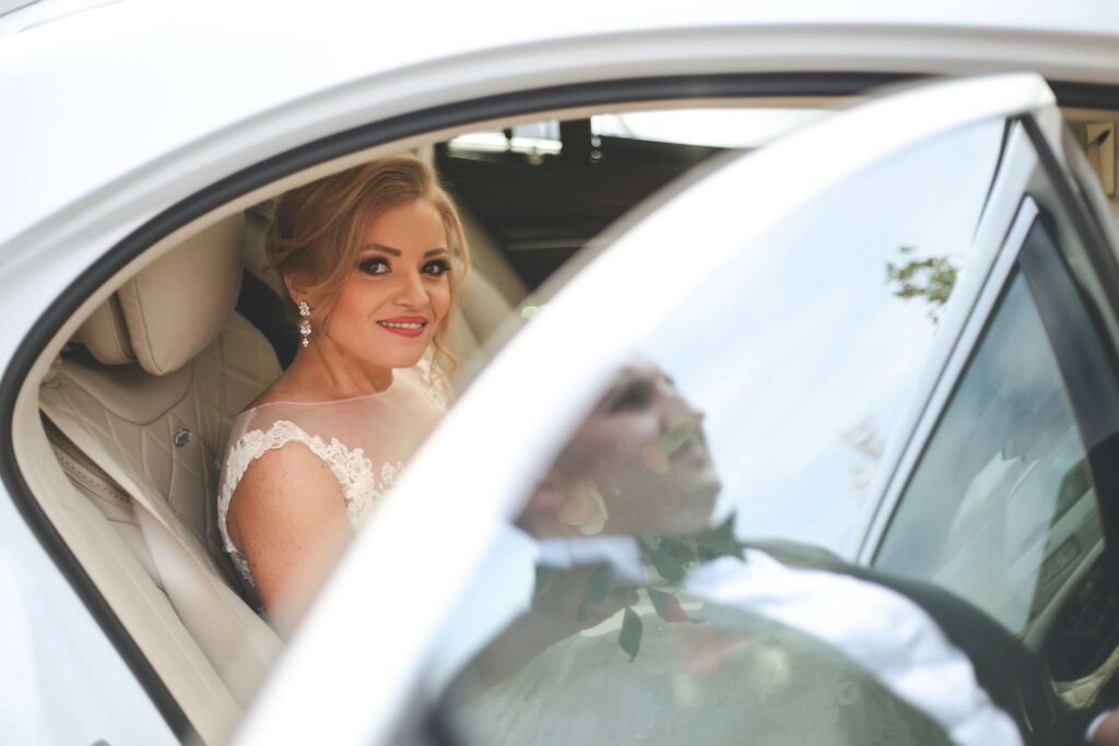 bride in a wedding car