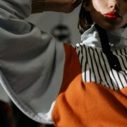 woman wearing a funnel neck jacket