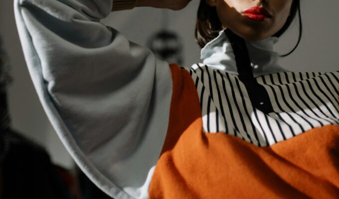 woman wearing a funnel neck jacket