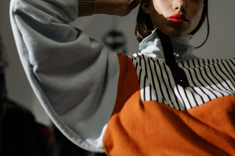 woman wearing a funnel neck jacket