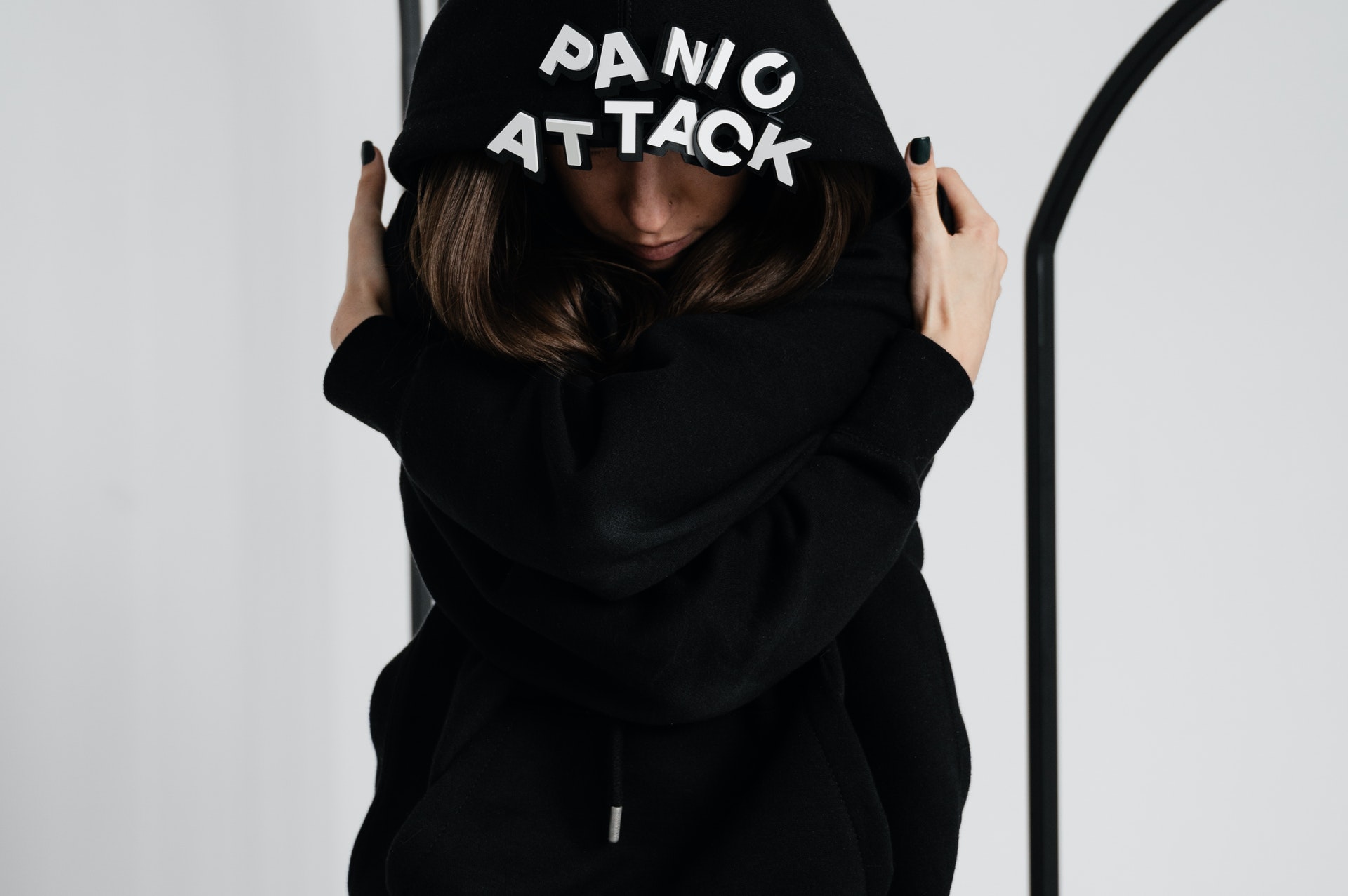 woman in a black hoodie